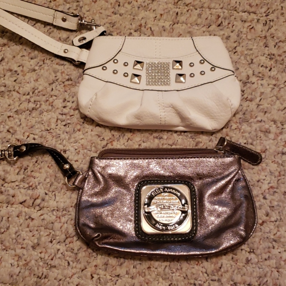 2 super cute Kathy Van Zeeland wristlets.